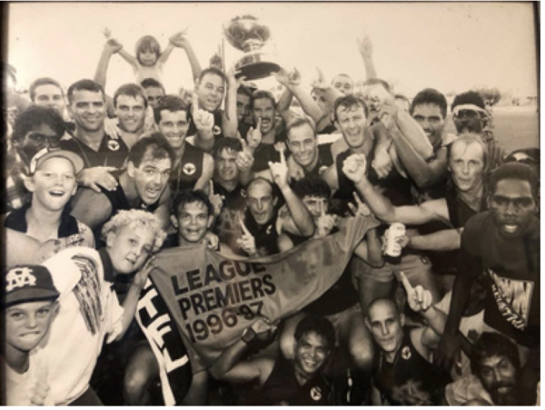 A sepia photo of a historical premiership win.